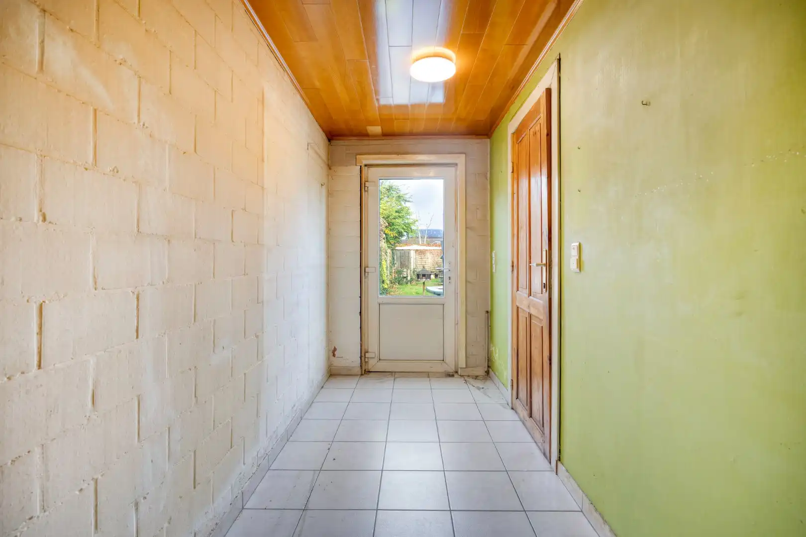 Te renoveren woning langs het centrum van Mol !  foto 10