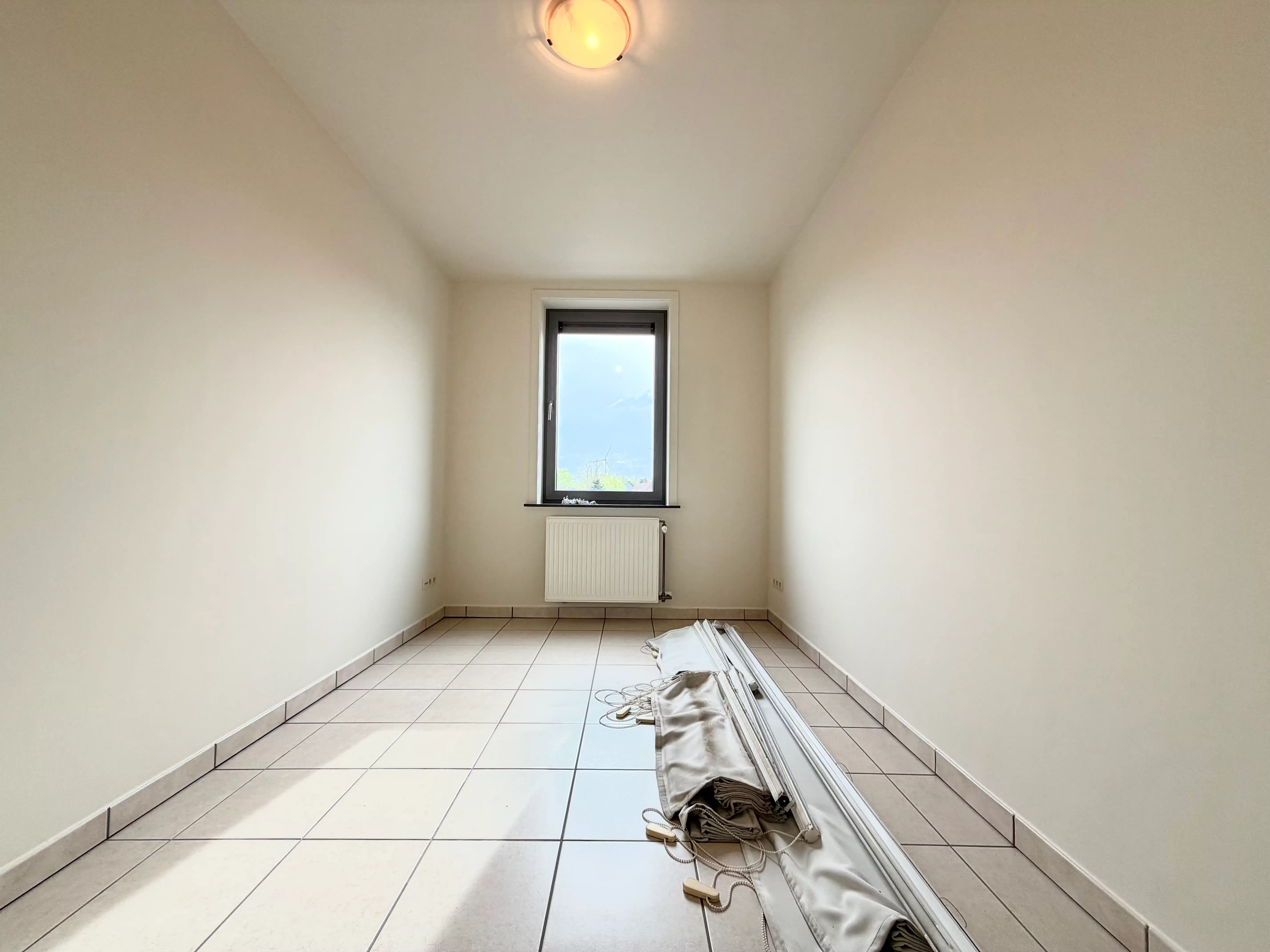 Ruim appartement met drie slaapkamers te huur in Evergem foto 11