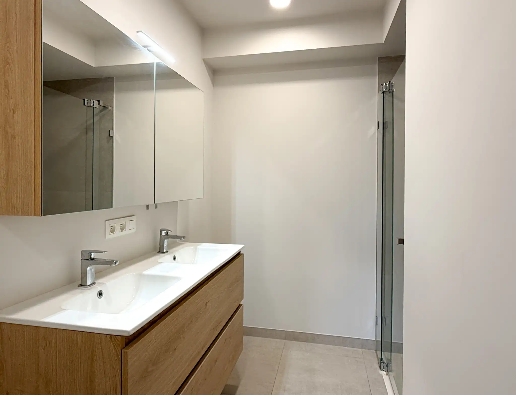 Energiezuinig appartement met twee slaapkamers en autostaanplaats dichtbij centrum Beveren foto 12