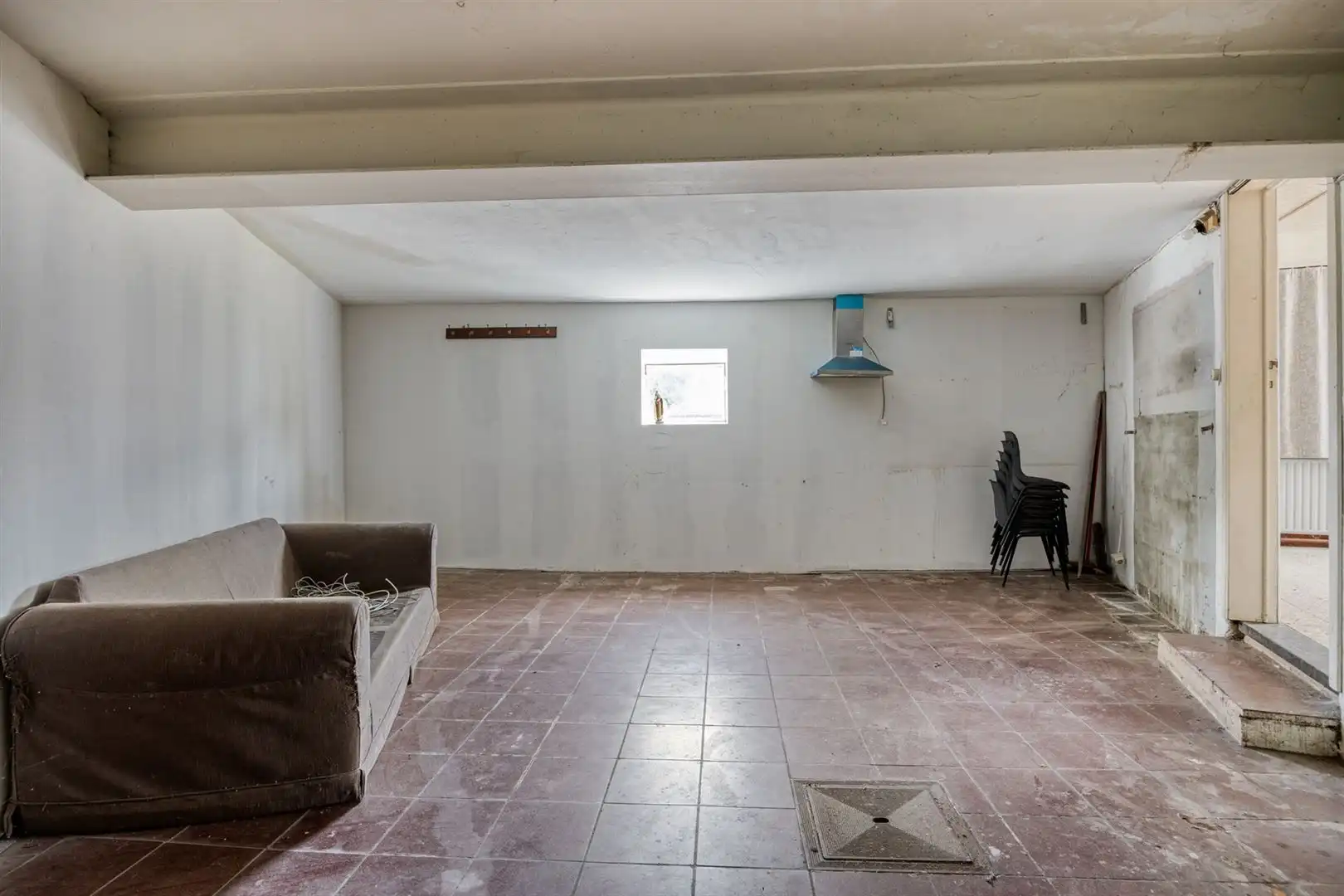 TE KOOP: Te renoveren woning met ruim perceel en projectmogelijkheden in Lummen! foto 15
