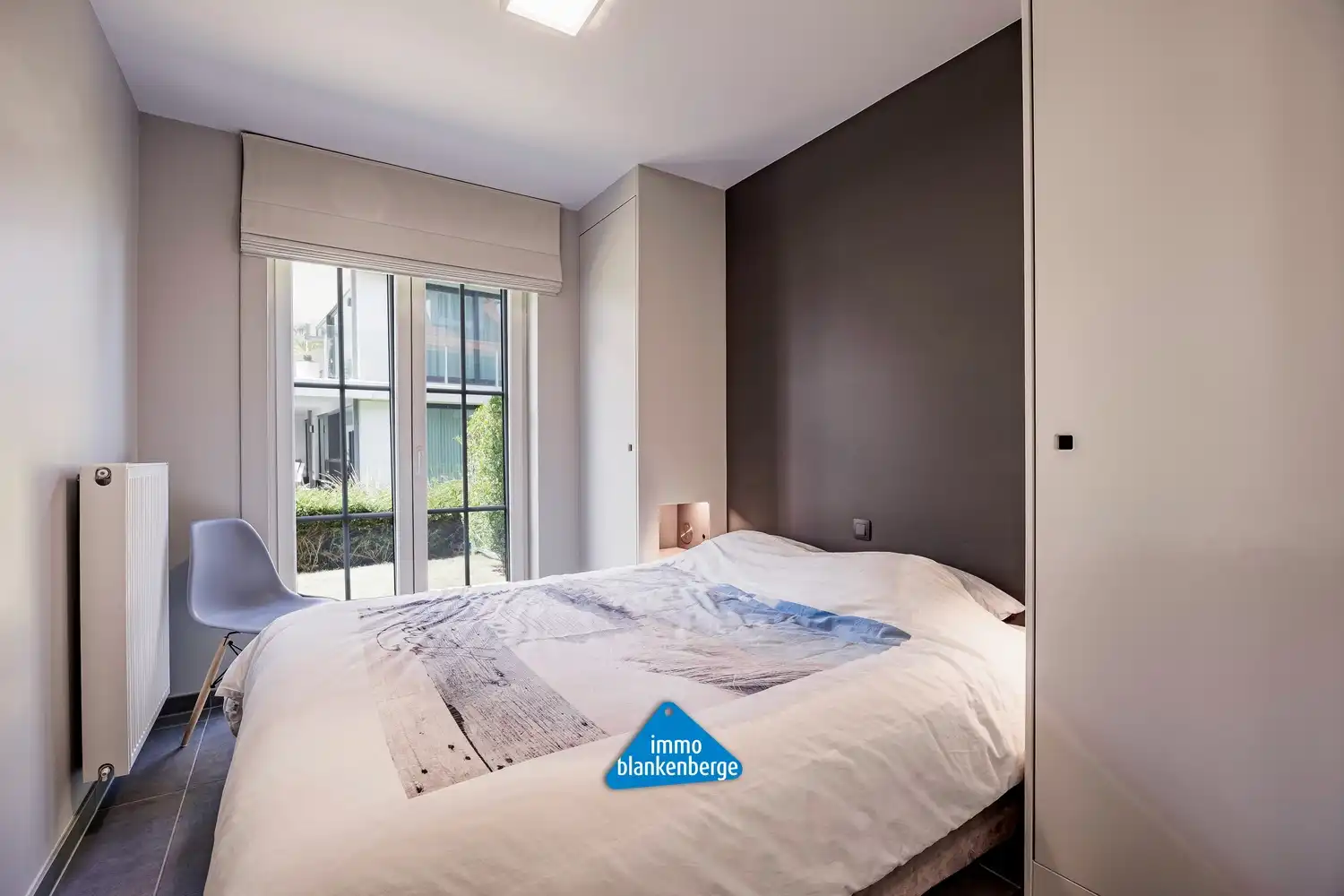 Gelijkvloers 2-slaapkamerappartement met tuin en luxe afwerking in De Haan foto 11