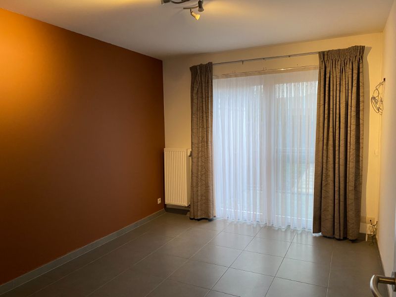 Gelijkvloers appartement met voor- en achtertuin en garage foto 14
