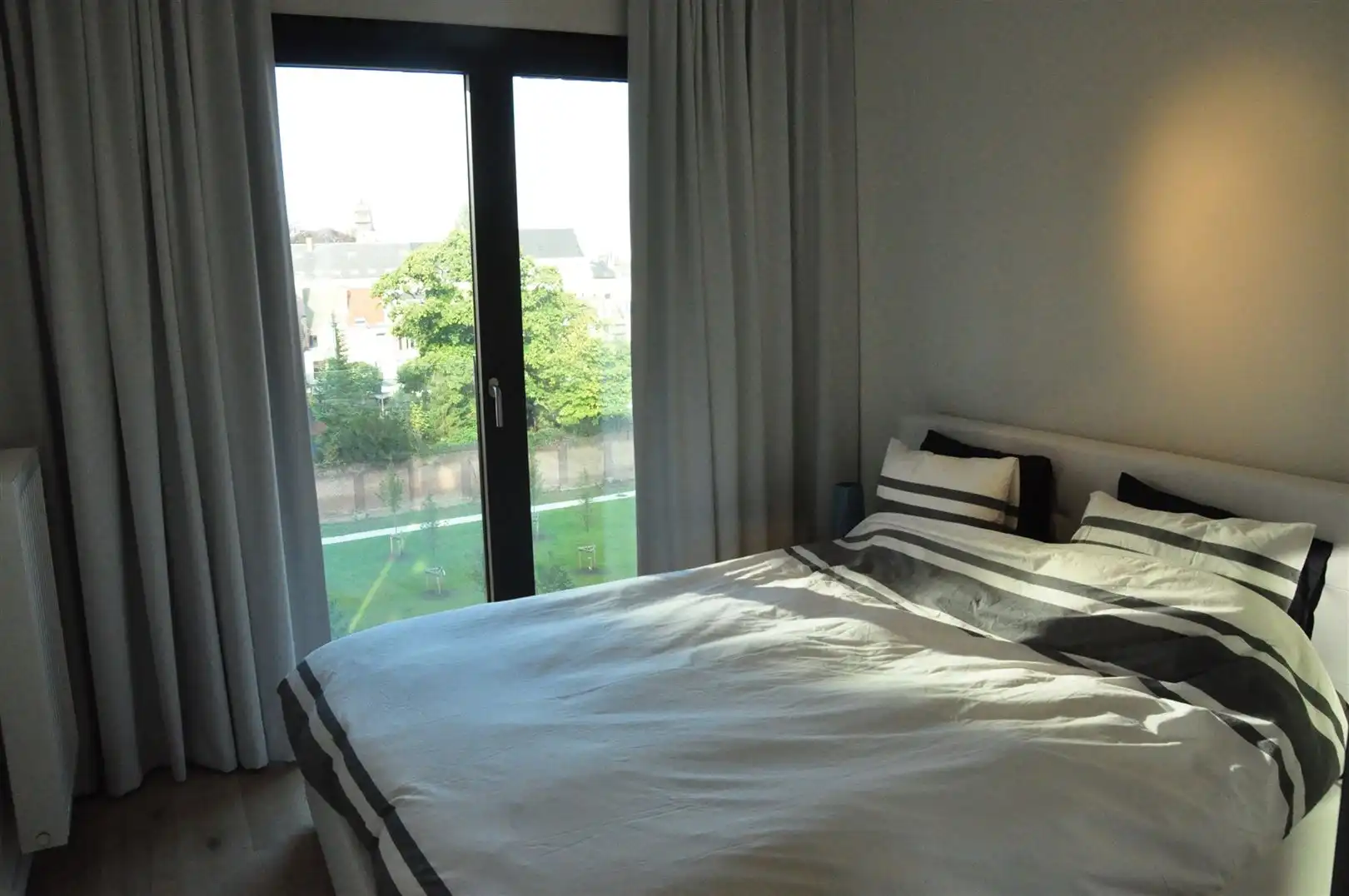 Gemeubeld 2-slaapkamerappartement met terras en parking! foto 11