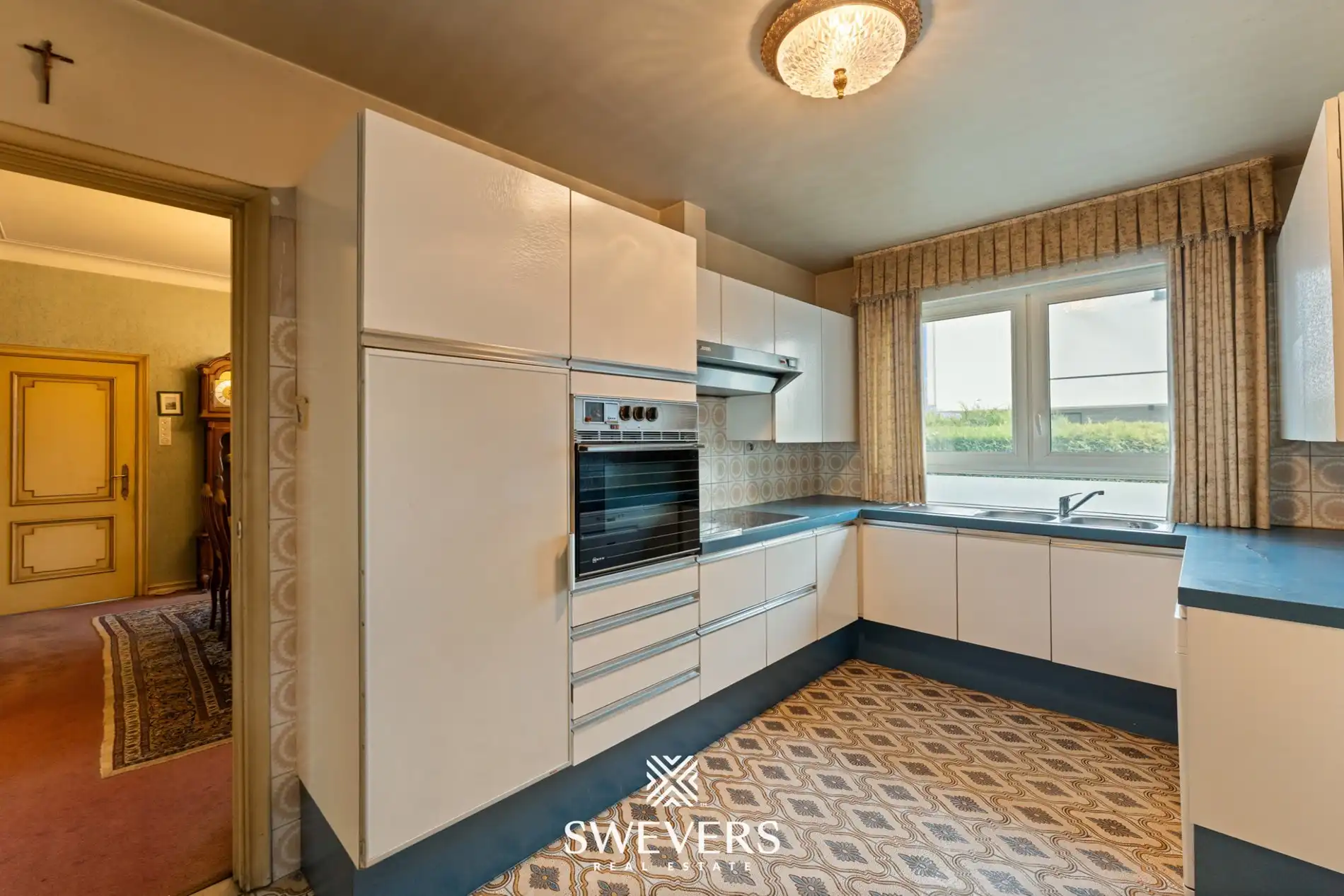 Karaktervolle halfopen bebouwing met uitzonderlijk potentieel en zonnige tuin nabij Hasselt centrum foto 10