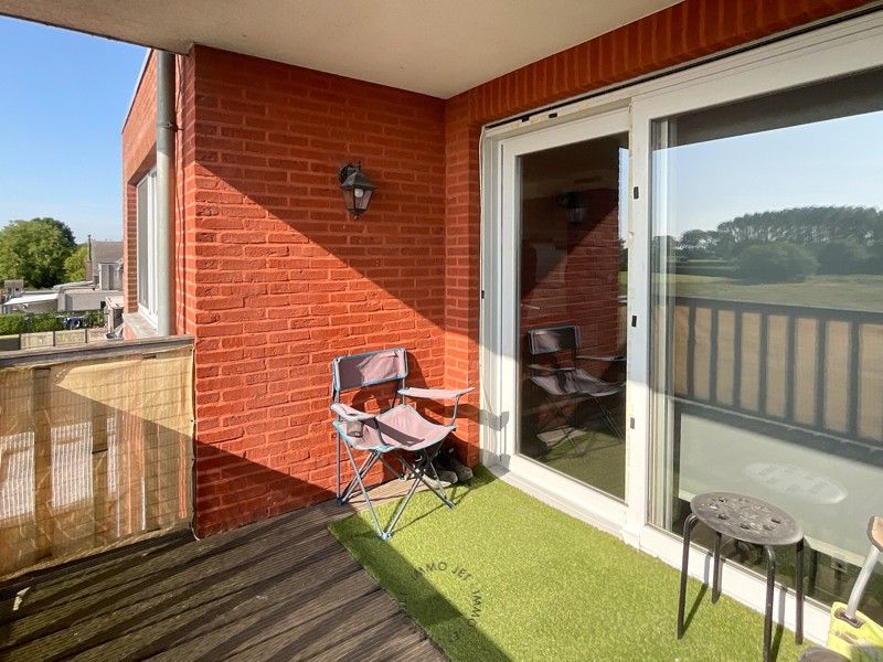 Centraal gelegen appartement met twee slaapkamers, terras en garage foto 10