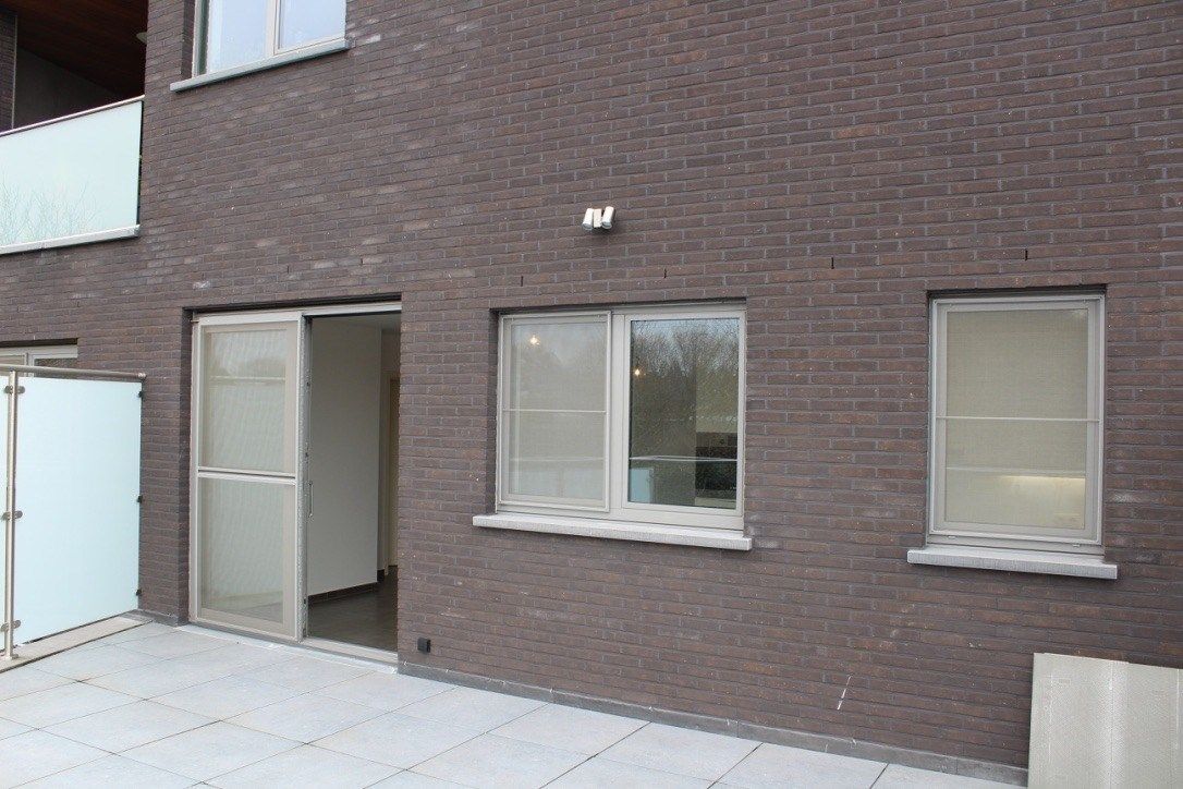 Appartement met 1 slpk en zeer groot terras, privé-carport en fietsenberging foto 6