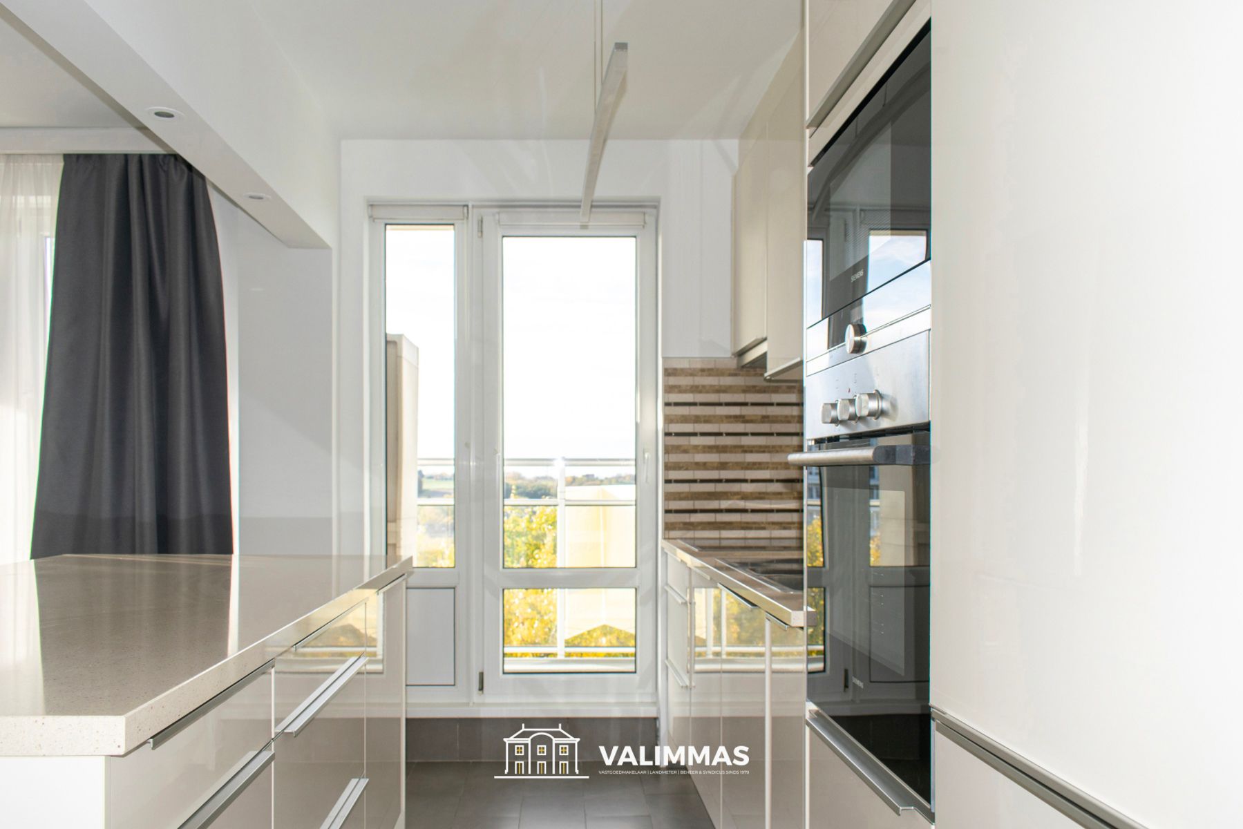 Verzorgd, energiezuinig appartement met mooi terras & kelder foto 7