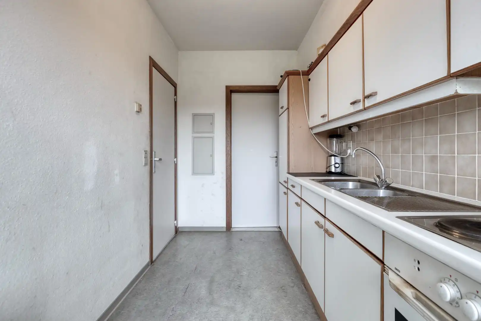 Ruim 3-slaapkamerappartement te koop in Genk foto 11