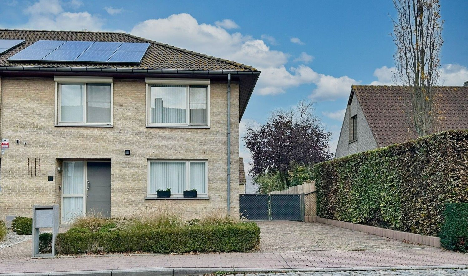 Ruime, lichtrijke woning met zonnige tuin+ aparte garage foto 19