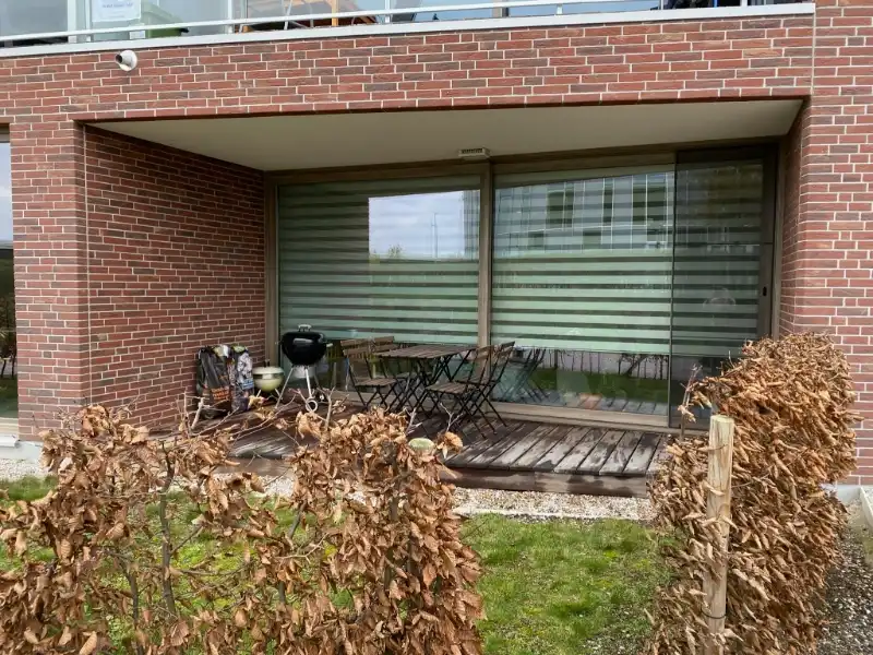 --- NIEUW ---&nbsp;Instapklaar gelijkvloers appartement met tuin op topligging nabij Gent-Sint-Pieters. foto {{pictureIndex}}