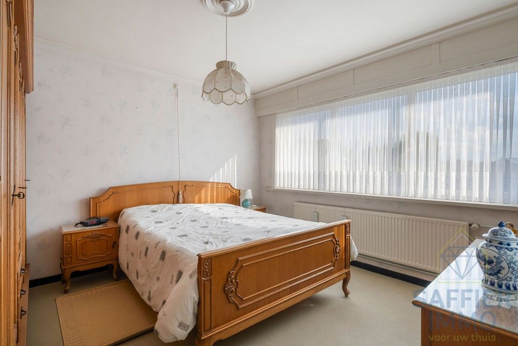 Ruime woning zonder renovatieplicht in de Seizoenswijk te Kuurne foto 27