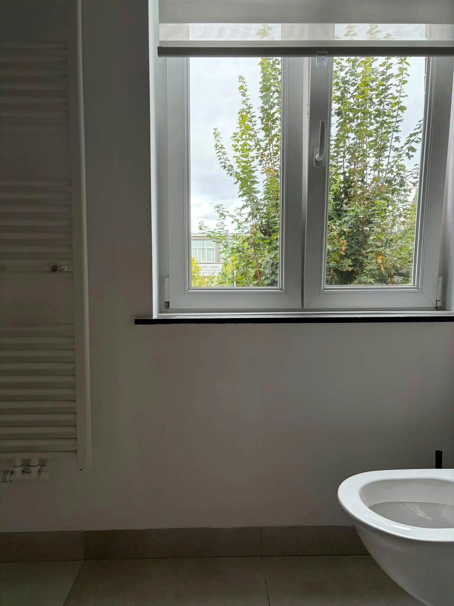 Opbrengsteigendom met drie entiteiten te koop in Laken foto 21