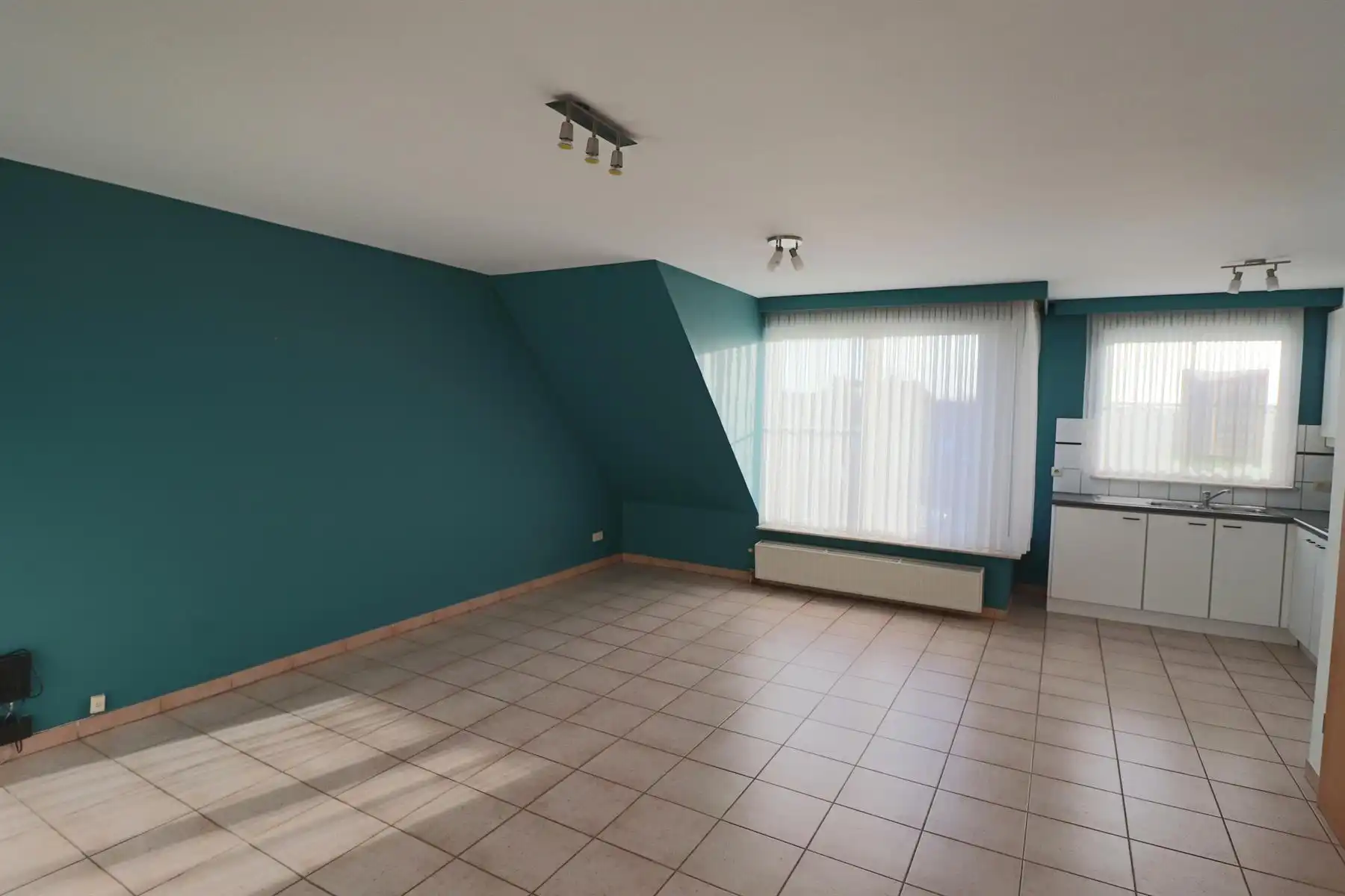 Een appartement op de 2de verdieping rechts met 1 slaapkamer, terras en garage. foto 2