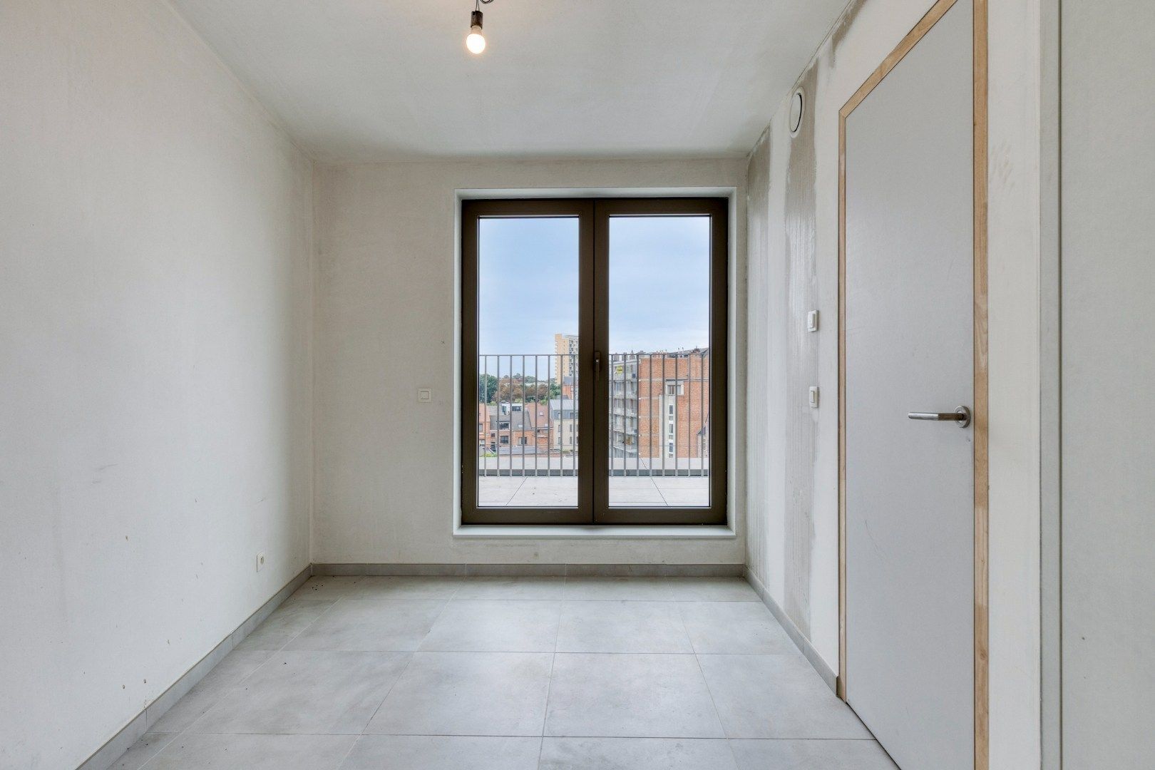 Nieuwbouw studio met 20m2 terras in hartje Leuven met kelderberging en parkeermogelijkheden! 6% BTW mogelijk! foto 8