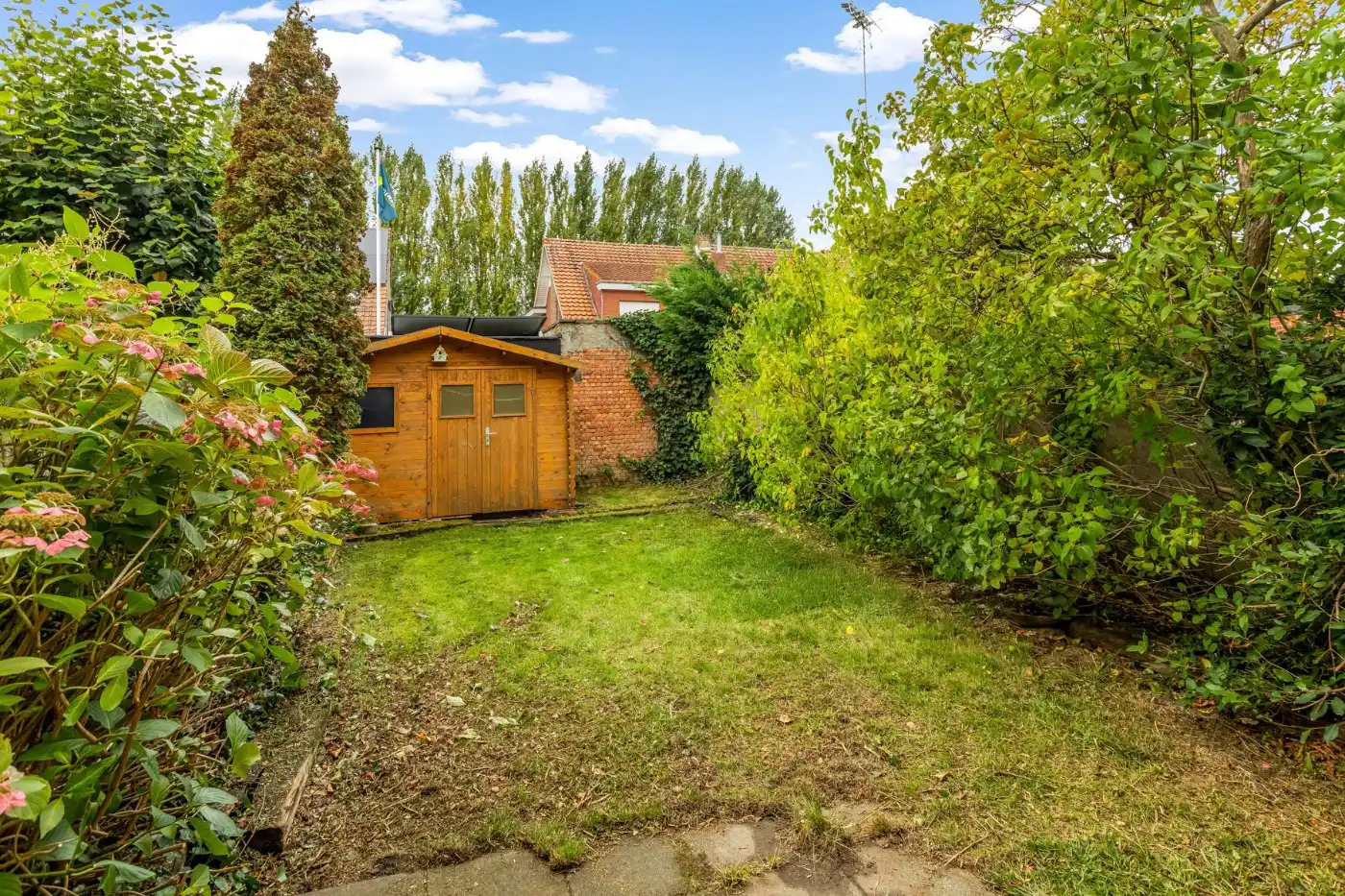 Centraal gelegen, op te frissen woning met 2 à 3 slpk., inpandige garage en tuin foto 27