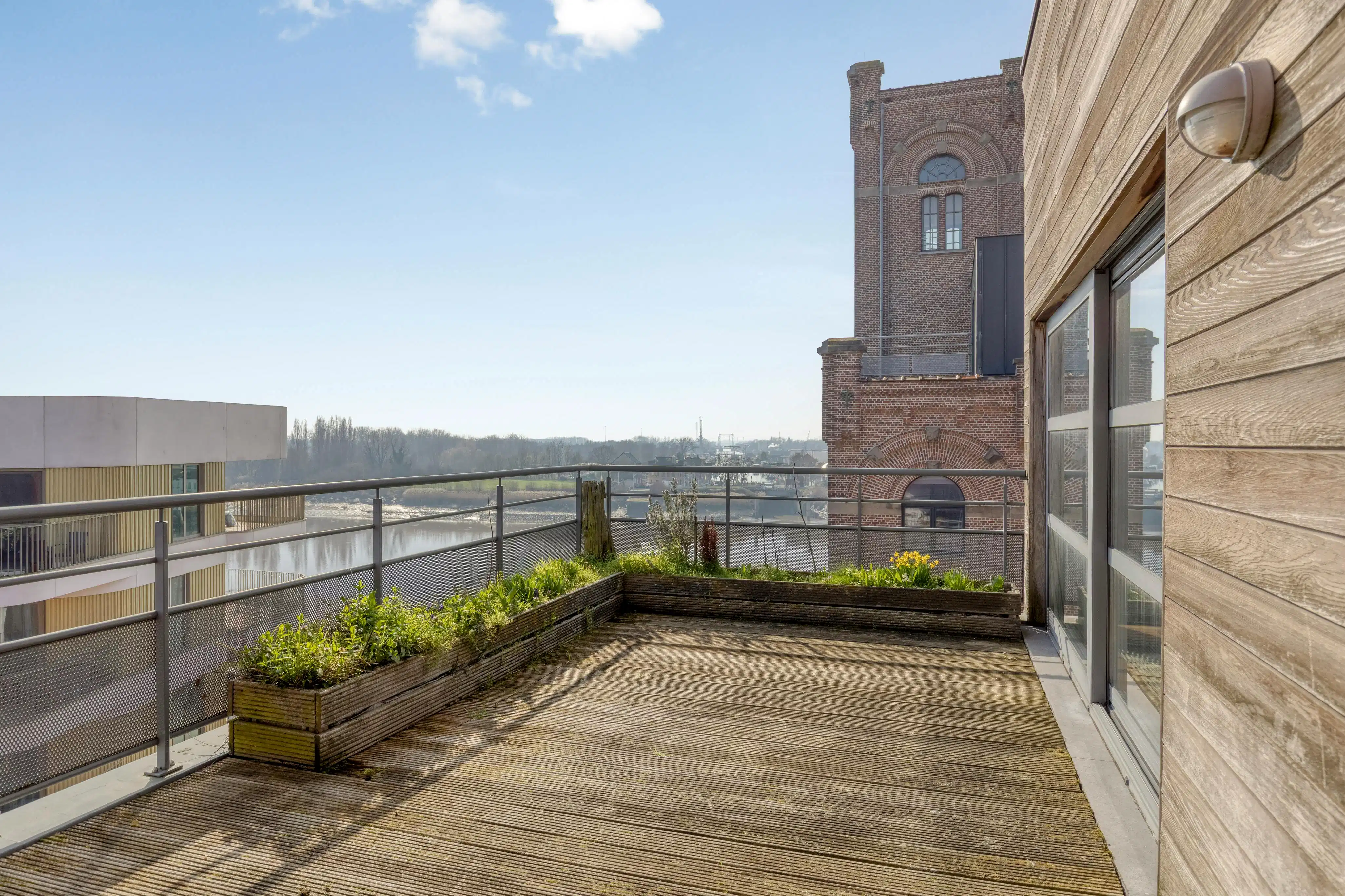 Instapklaar dakappartement met zicht op het water in Boom foto 7