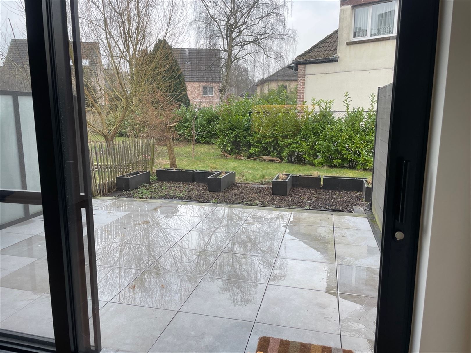 Gelijkvloers appartement met zonnig tuintje. foto 2