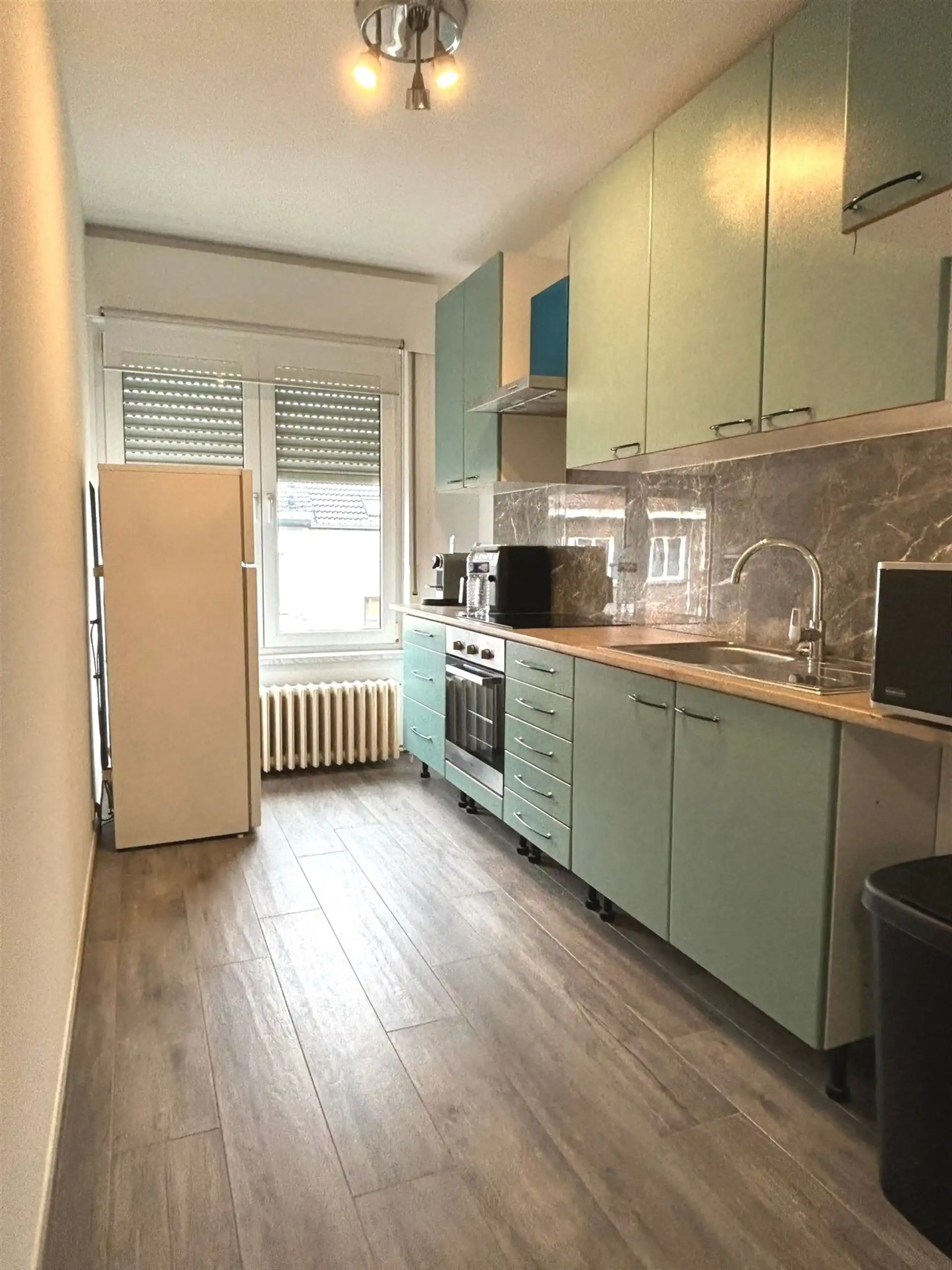 Prachtig appartement (1 slpks) met een kelder, kleine garage, autostaanplaats & GEEN LASTEN foto 10