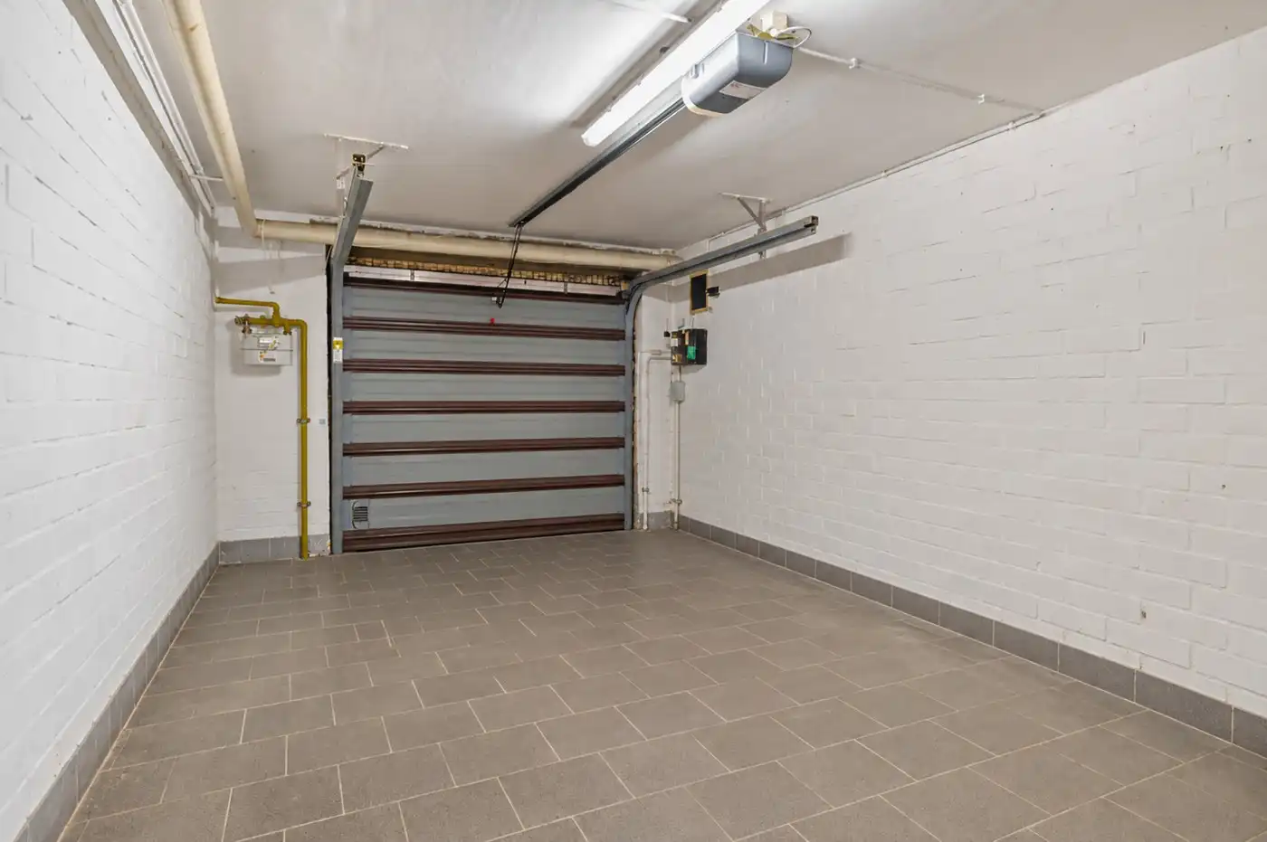Ruime, instapklare bel-etagewoning met 3 slpk., inpandige garage en tuin foto 18
