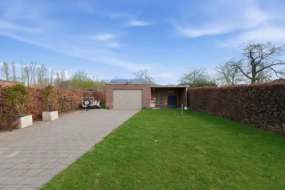 Instapklare gezinswoning met 3 slaapkamers en ruime tuin en garage in Tongeren foto 36