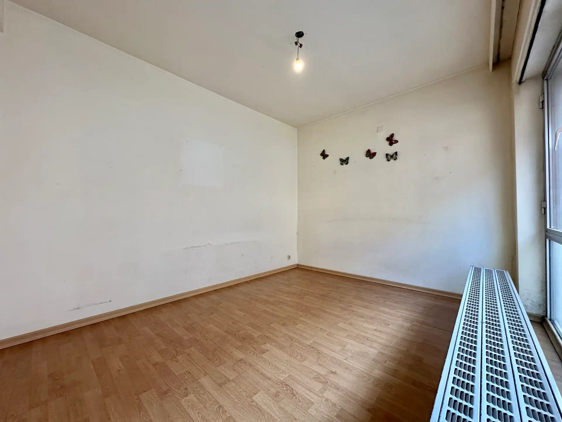 Gelijkvloers éénslaapkamerappartement met garage foto 7
