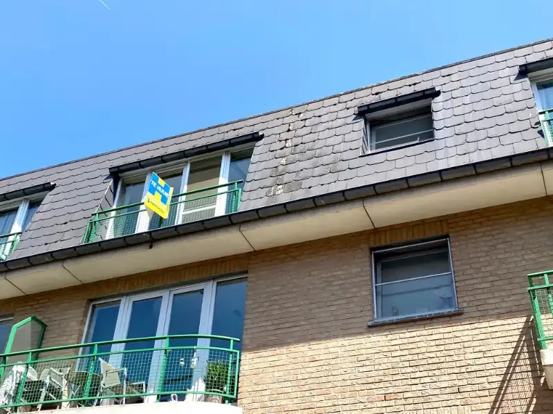Gezellig, centraal gelegen dakappartement met 1 slaapkamer en parkeerplaats foto 2