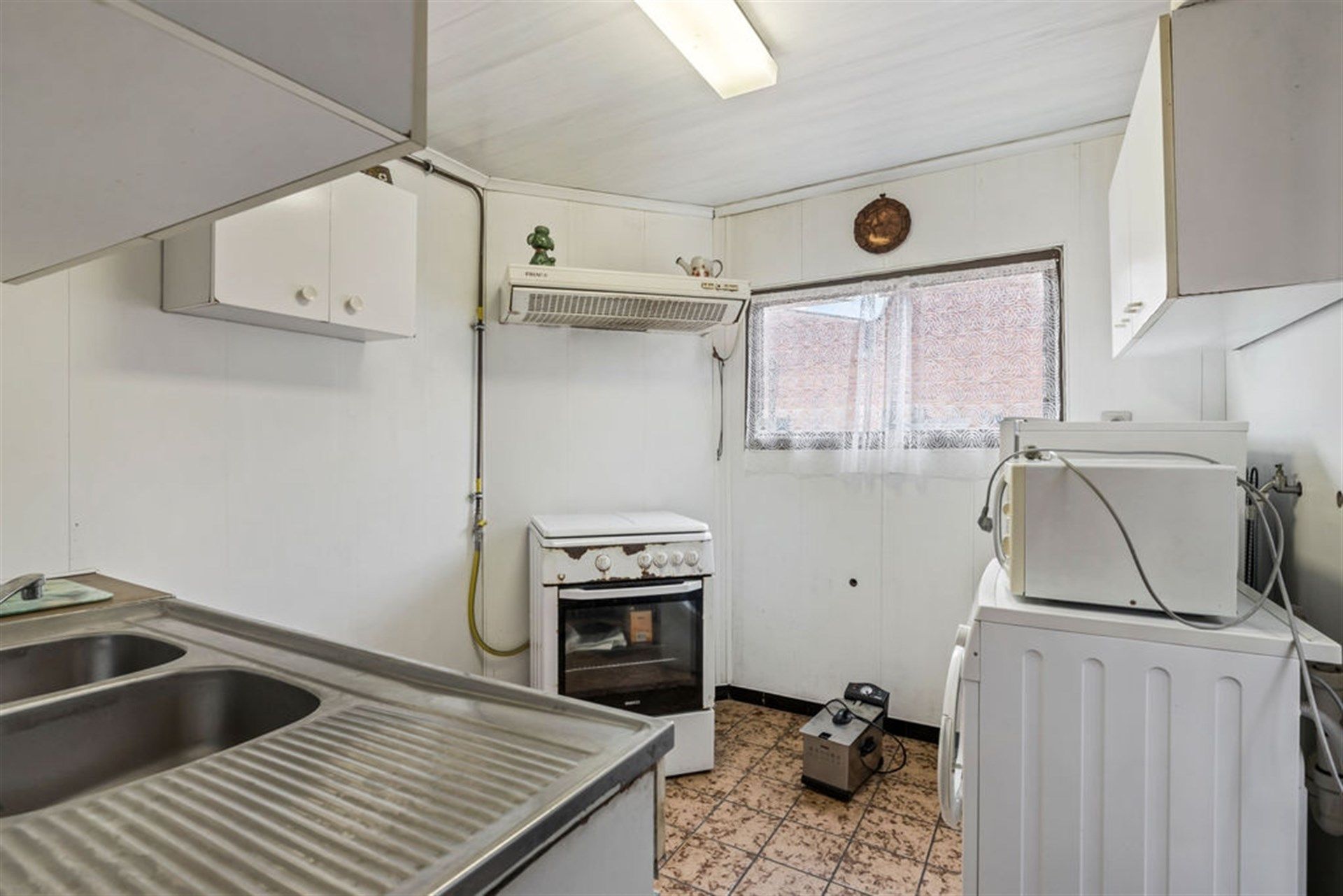 Potentiële gezinswoning of 2 bouwgronden in het hartje van Sint-Gillis-Waas foto 9