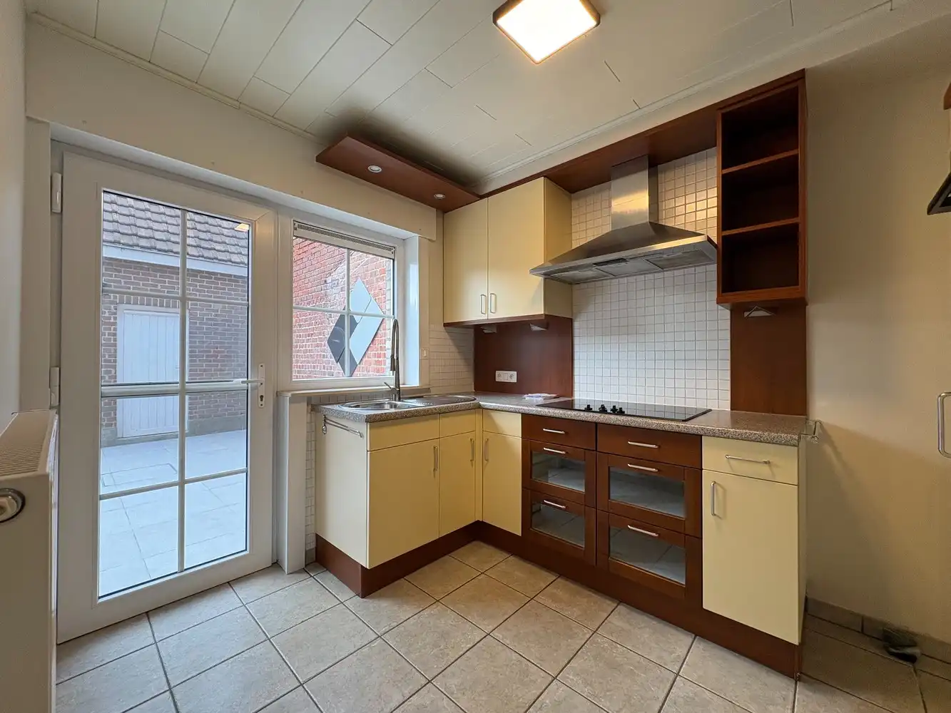 Charmante, gerenoveerde halfopen woning met tuin + garage foto 6