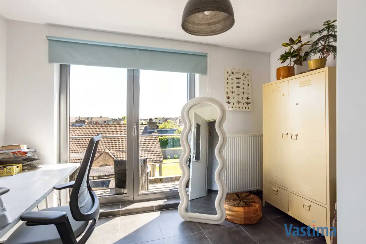 Lichtrijk appartement met 2 terrassen, staanplaats en extra zolderruimte foto 9