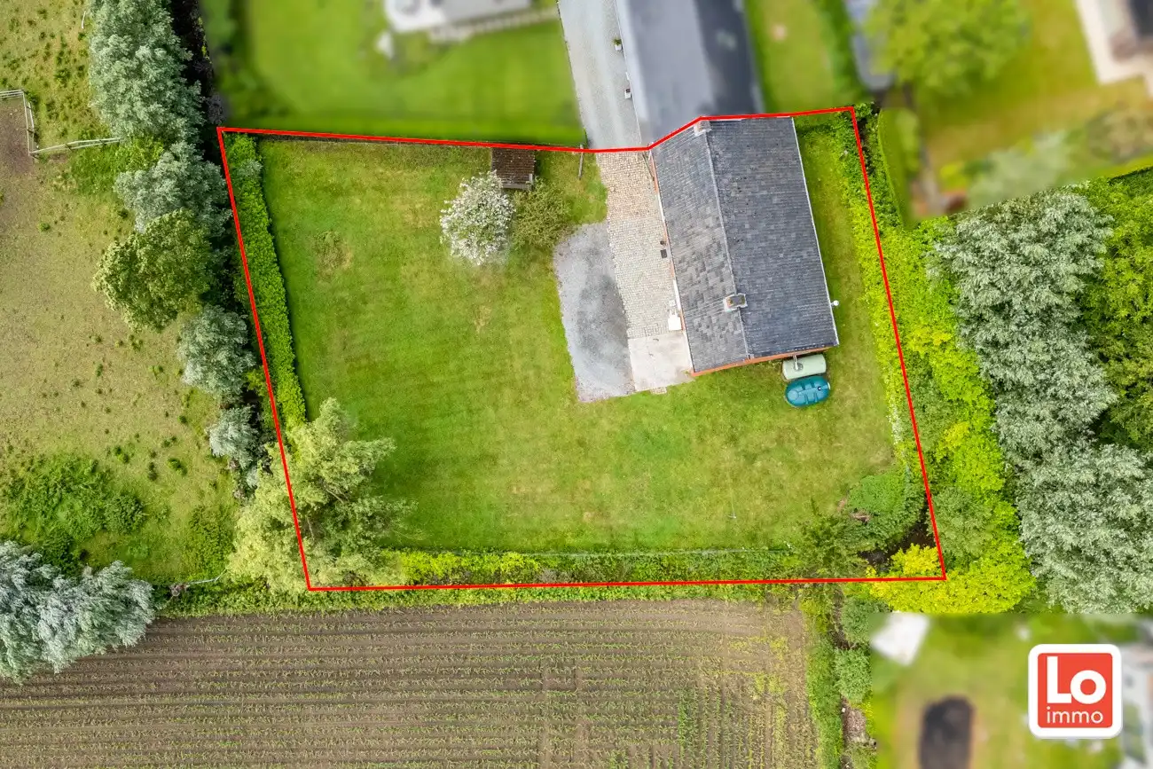Landelijke te renoveren halfopen gelijkvloerse woning met inpandige garage en grote tuin met open zicht op een makkelijk bereikbare locatie in Zeveneken! foto 28