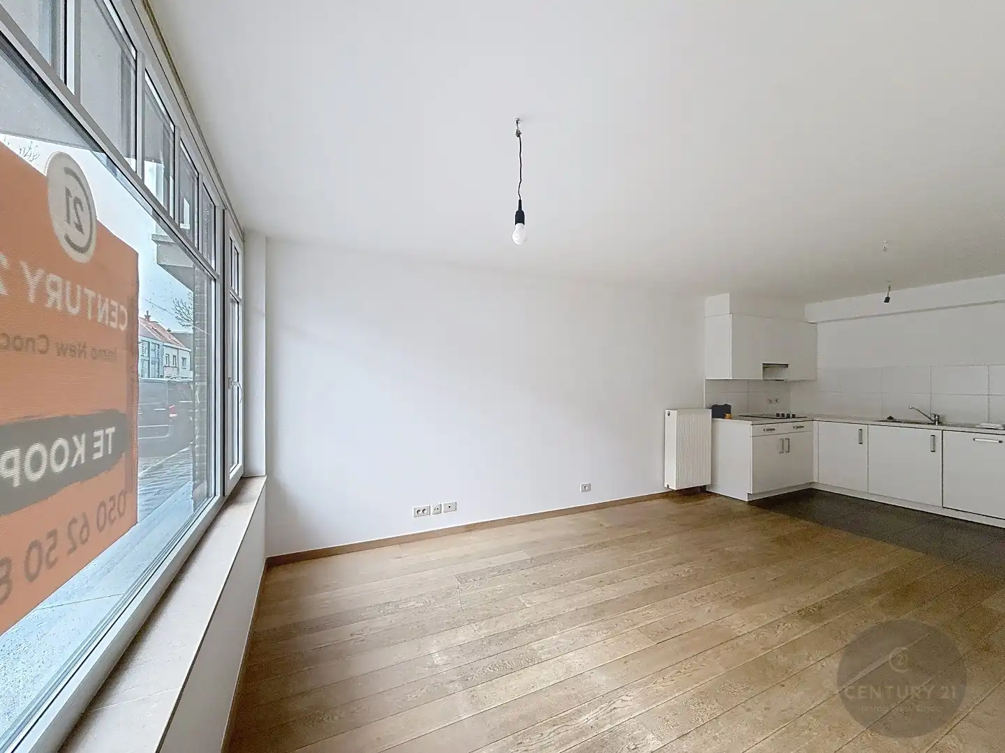 2 slaapkamer appartement met koer en garagestaanplaats foto 3