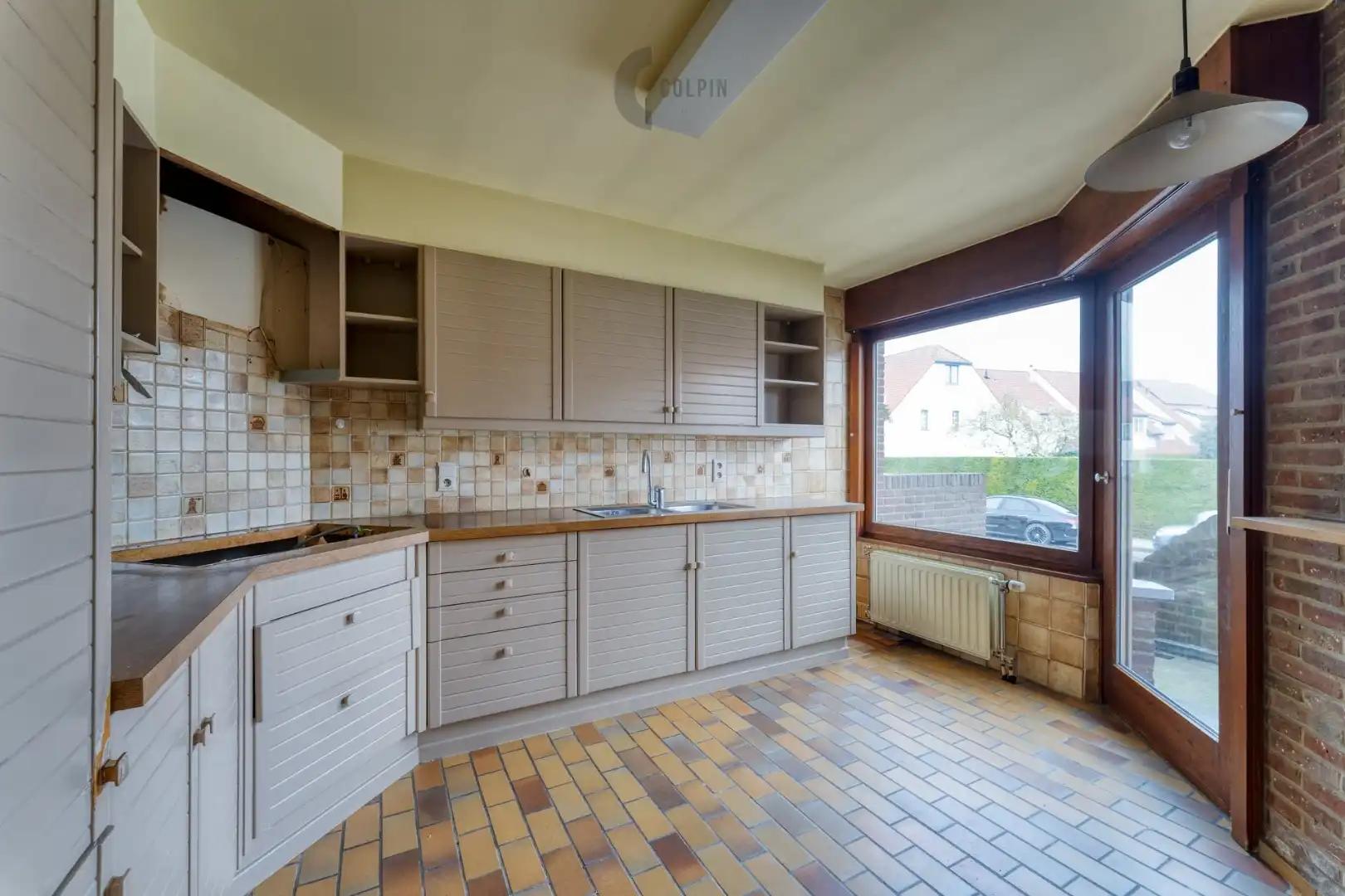 Charmante bel-étage woning nabij strand en park van Heist & Duinbergen – met renovatiepotentieel en zonnige tuin. foto 8