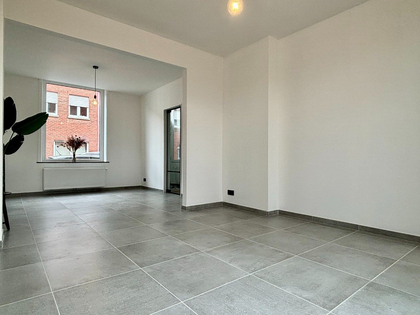 Instapklare, knap gerenoveerde rijwoning op wandelafstand van het centrum van Kuurne. foto 10