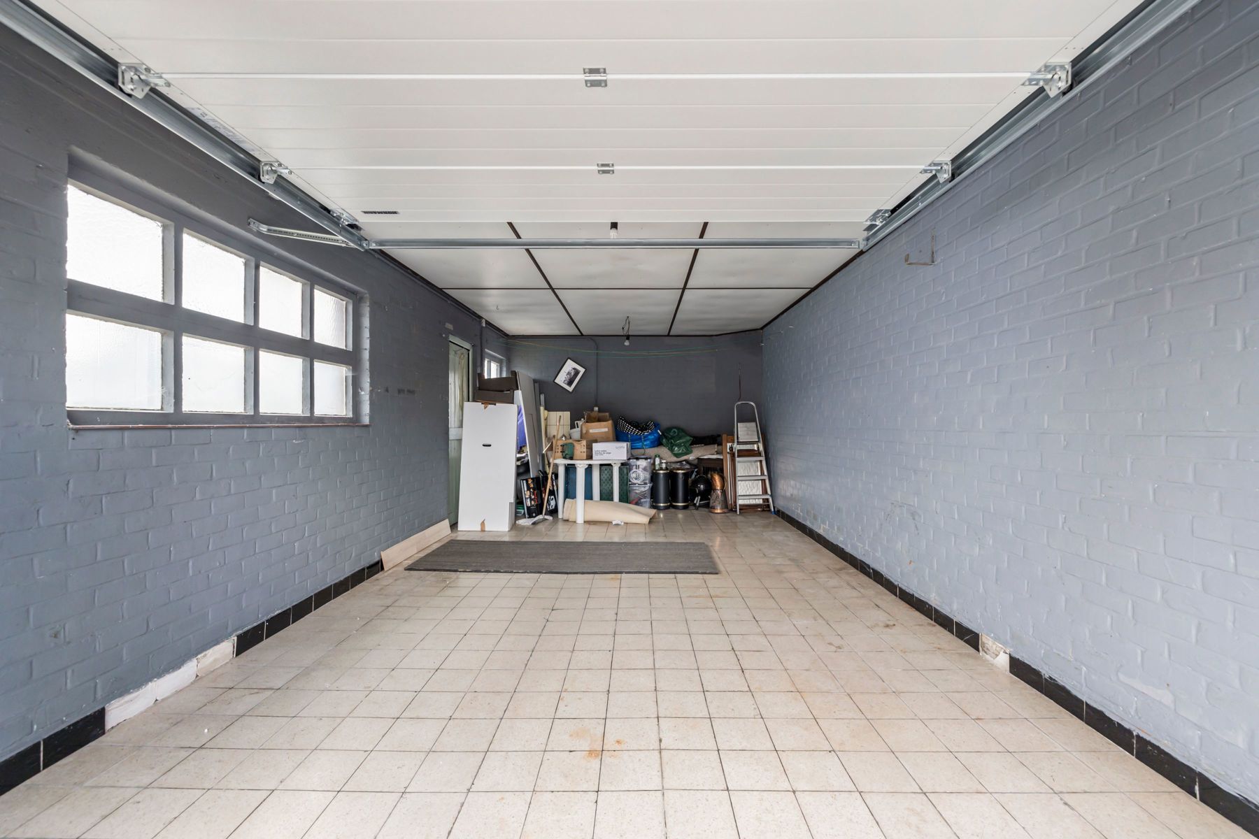 Bungalow met veel potentieel, aangename tuin en garage foto 29