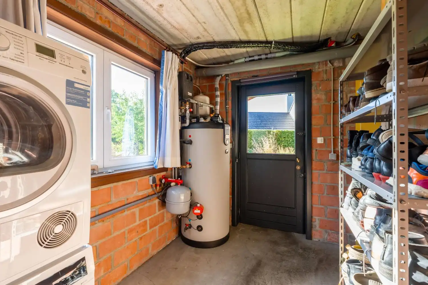 Rustig gelegen en vrijstaande woning met 3 ruime slaapkamers, een oprit met een garage en een mooie tuin in het groene Oud-Heverlee! foto 13