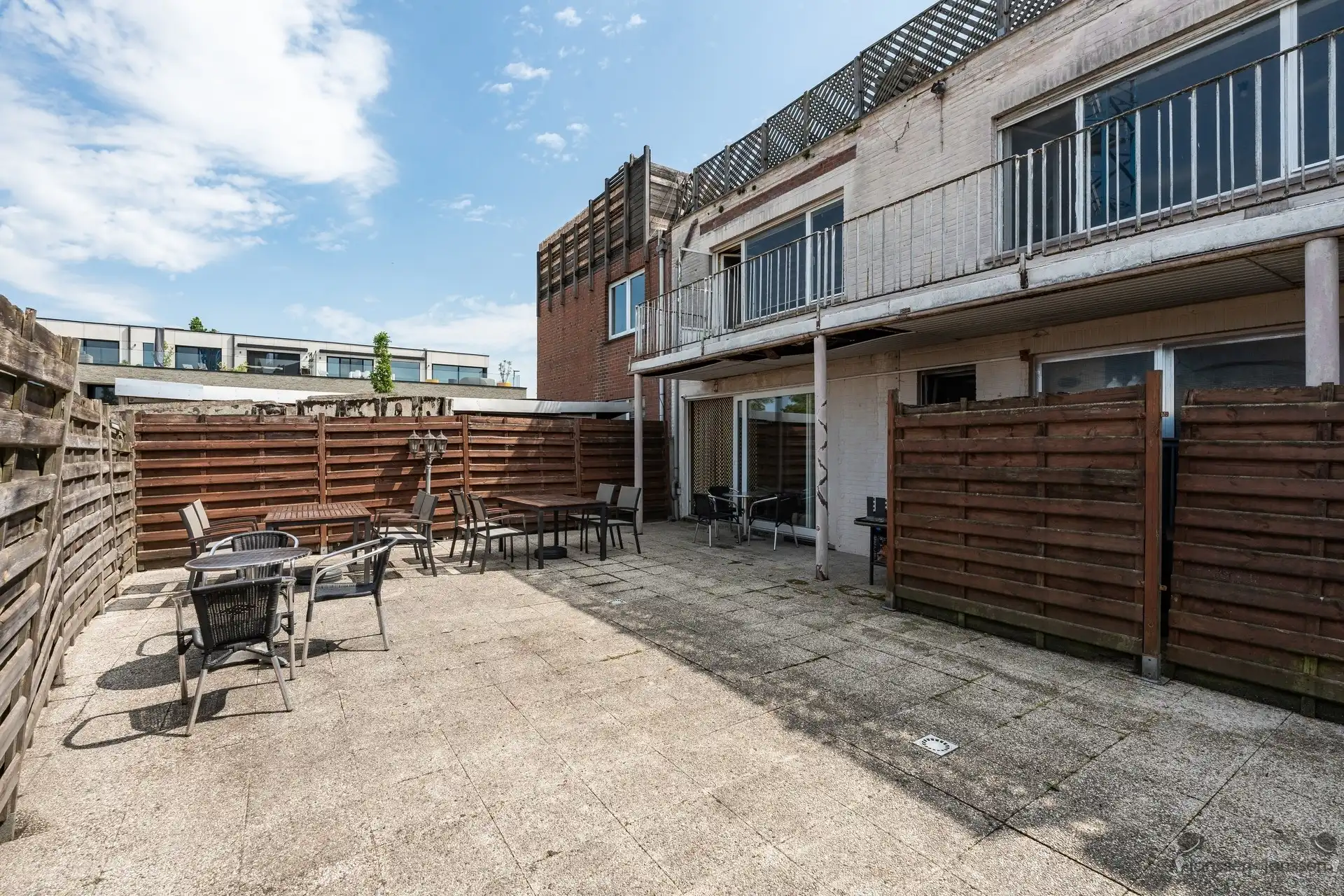 Opbrengsteigendom met 2 verhuurde appartementen en handelsgelijkvloers in het centrum van Brecht foto 11