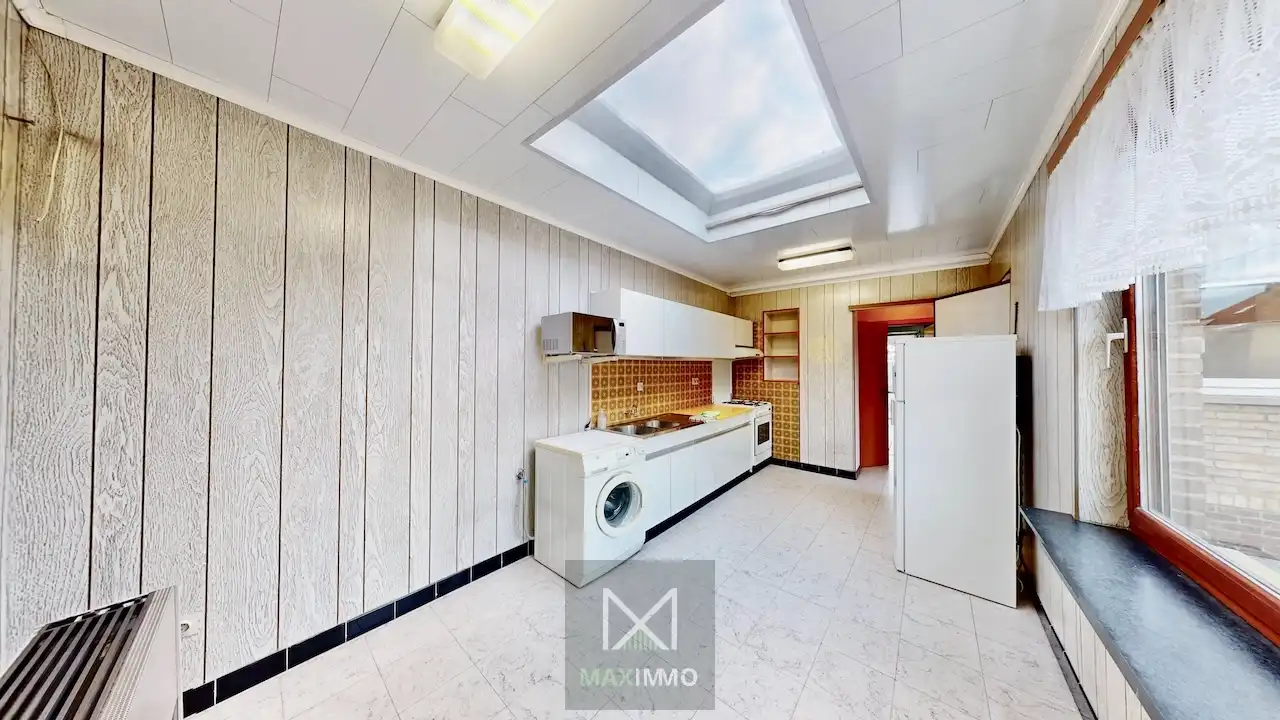 Te renoveren woning met tuin, garage en uitbreidingsmogelijkheden nabij centrum en Leie foto 4