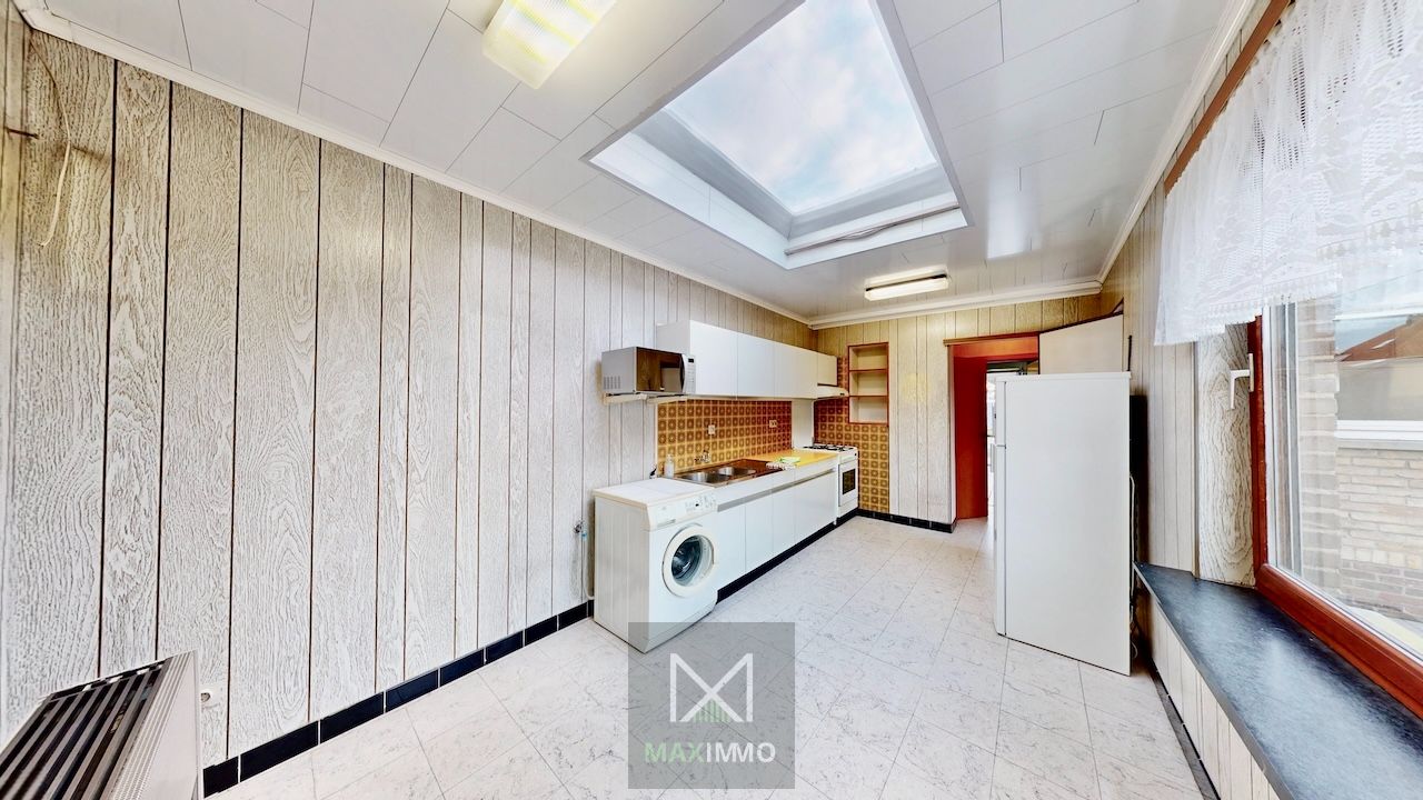 Te renoveren woning met tuin, garage en uitbreidingsmogelijkheden nabij centrum en Leie foto 4