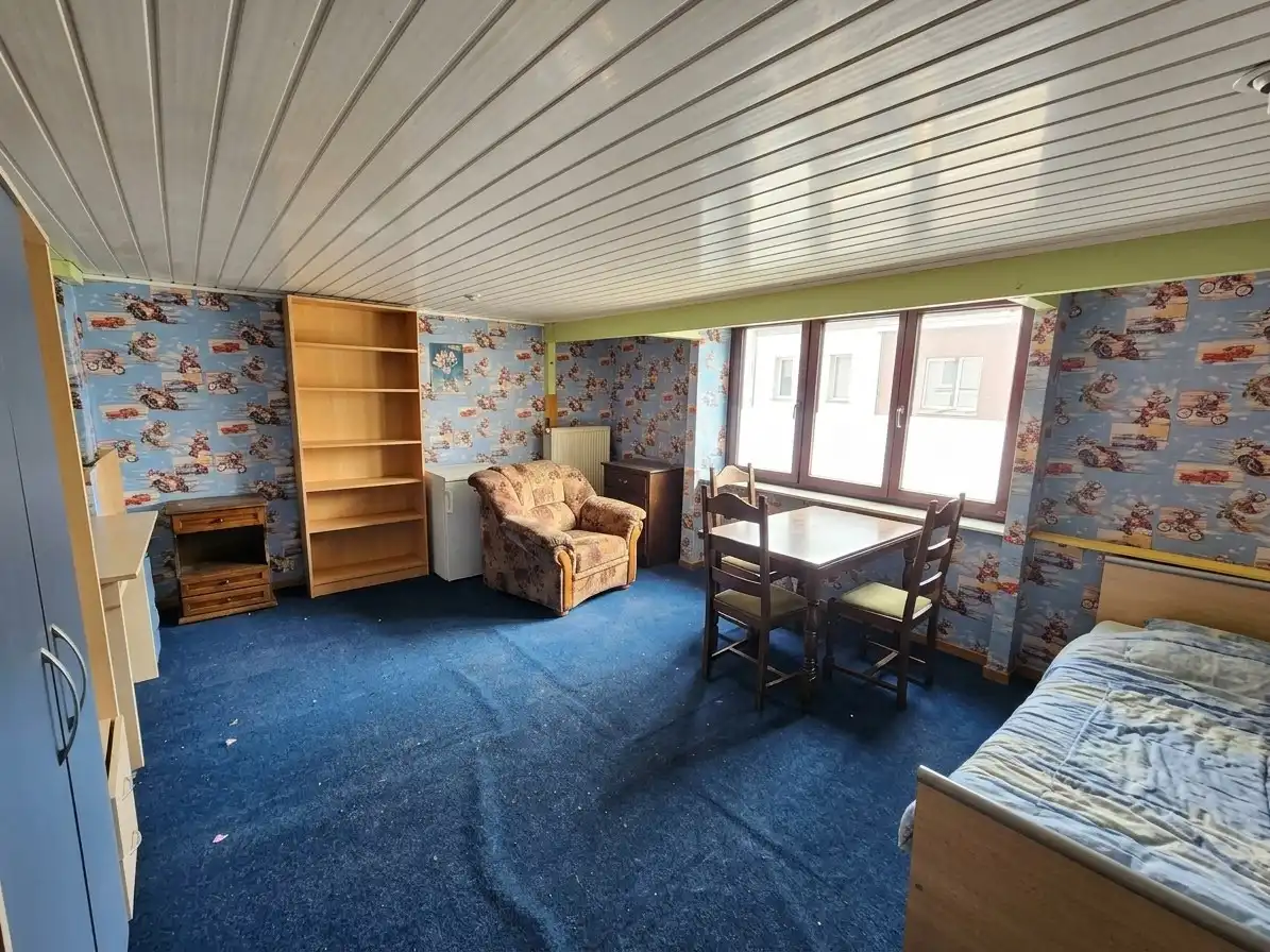 Te renoveren rijwoning op topligging! foto 8
