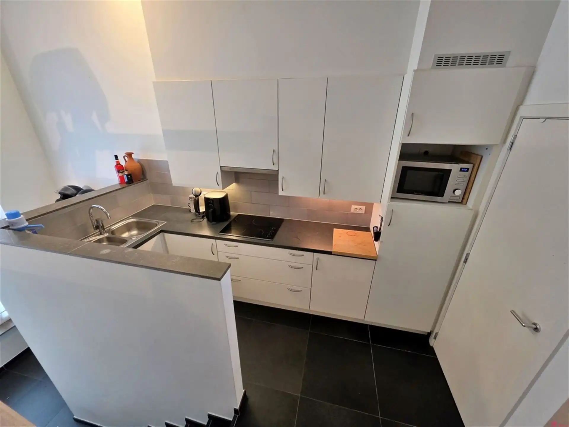 Gelijkvloers appartement met autostaanplaats foto 4