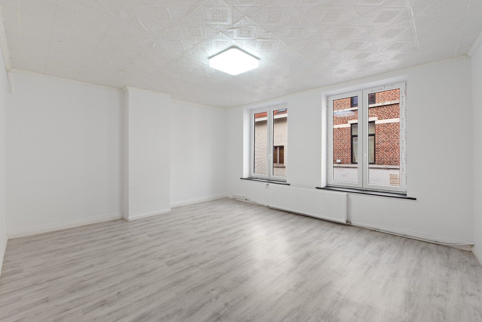 Polyvalente rijwoning met grote handelsruimte te Tienen foto 11