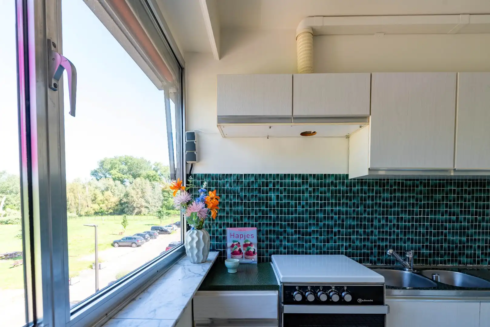 Appartement met 2 slpk., garage en rustgevend groen uitzicht foto 9