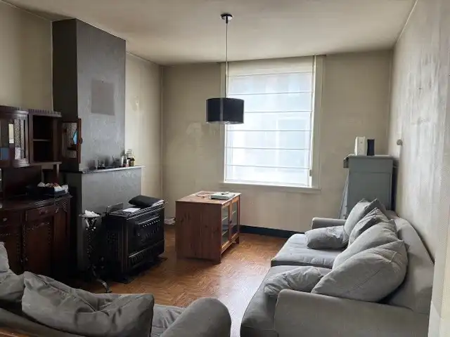 Te renoveren woning met 3 slaapkamers en leuke tuin op een totale oppervlakt van 215m². foto 5
