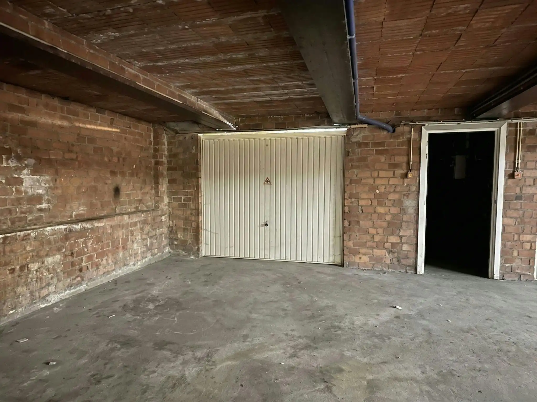 Ondergrondse garagebox in Hasselt foto {{pictureIndex}}