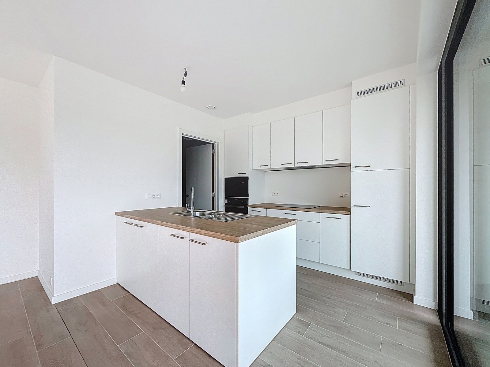 Energiezuinig nieuwbouwappartement met terras en garage. foto 7