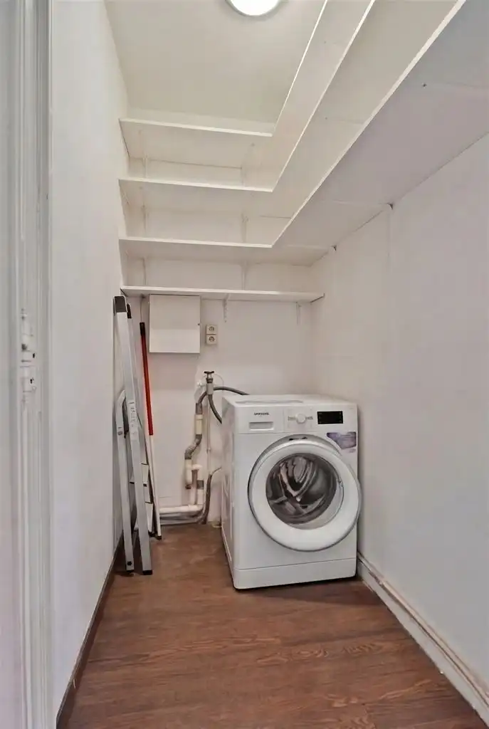 Zeer ruim 2 (+1)-slaapkamer appartement met overdekt terras, ondergrondse garagebox en aparte berging gelegen op wandelafstand van het centrum van Maaseik.  foto 19