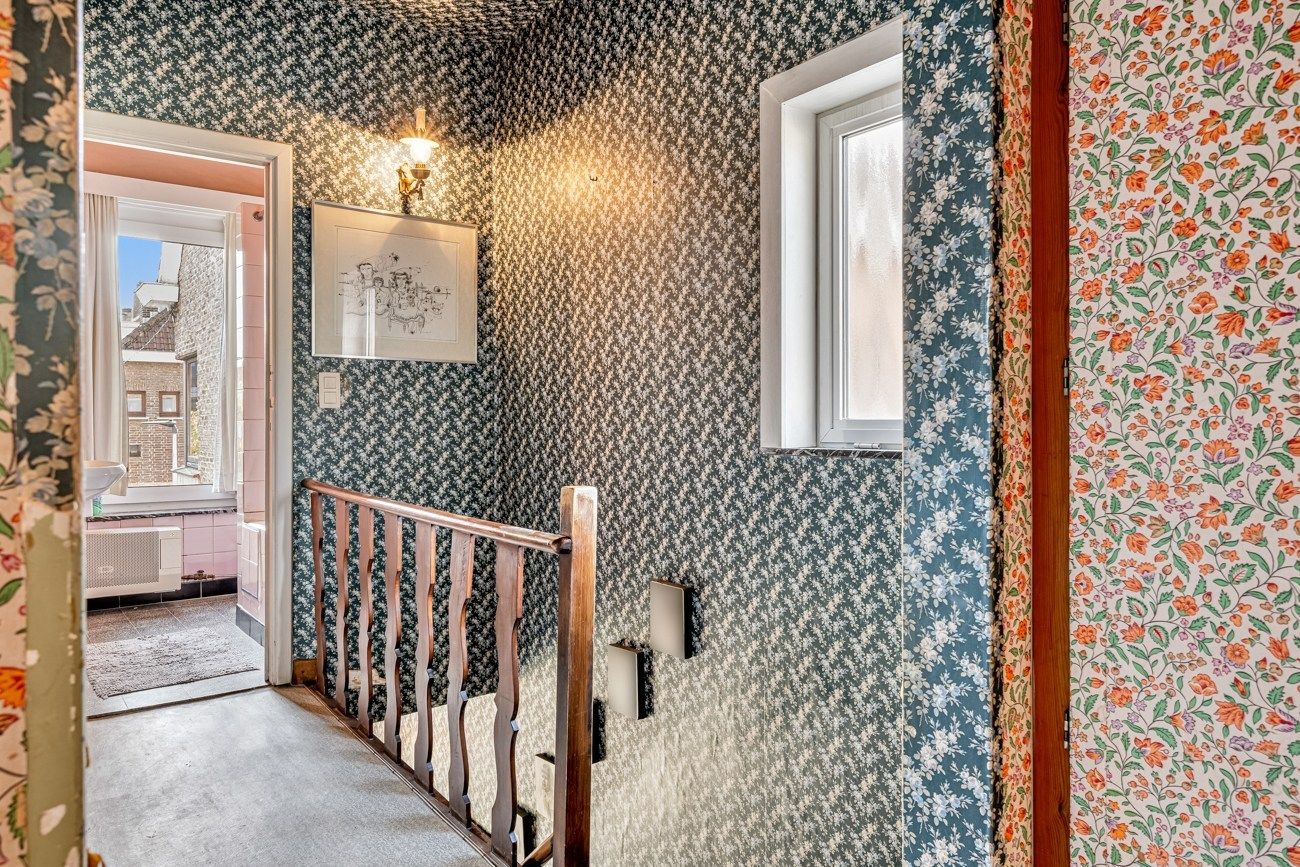 Gezellige, te renoveren, woning met charmante tuin aan een groenzone foto 18