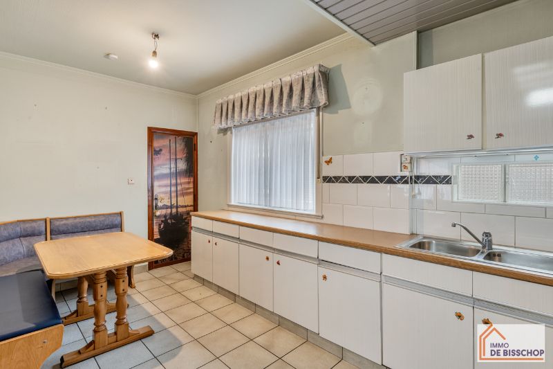 Te renoveren woning met 4 slaapkamers, zongerichte tuin en garage foto 7