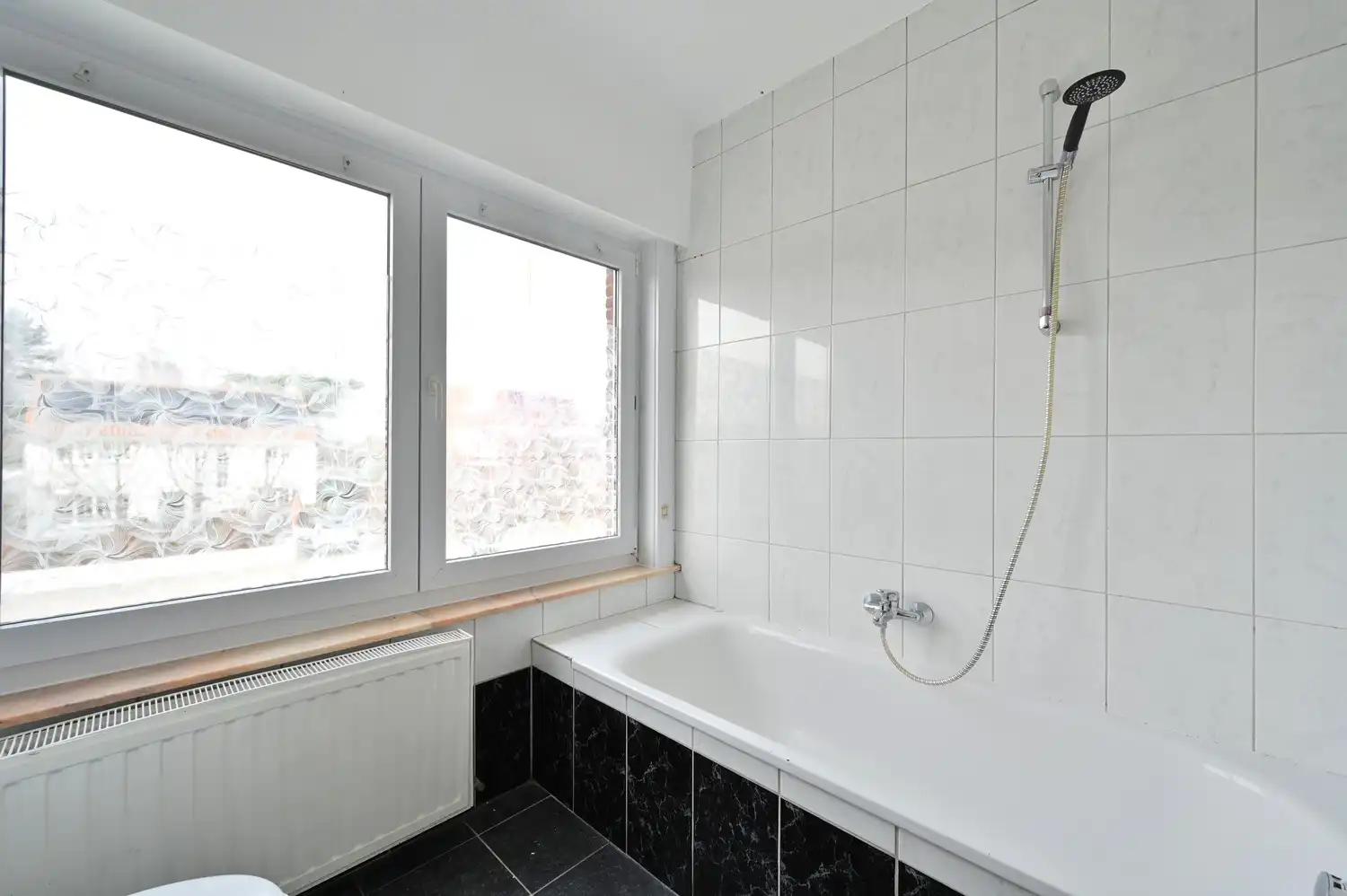 Instapklare gezinswoning met 3 slpk en gezellige stadstuin foto 16