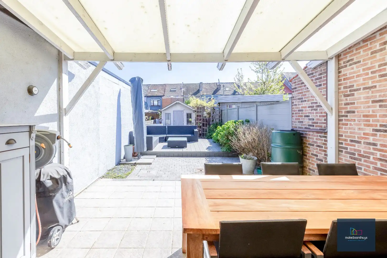 Goed onderhouden en ruime woning in rij met tuin/terras te Wondelgem foto 11